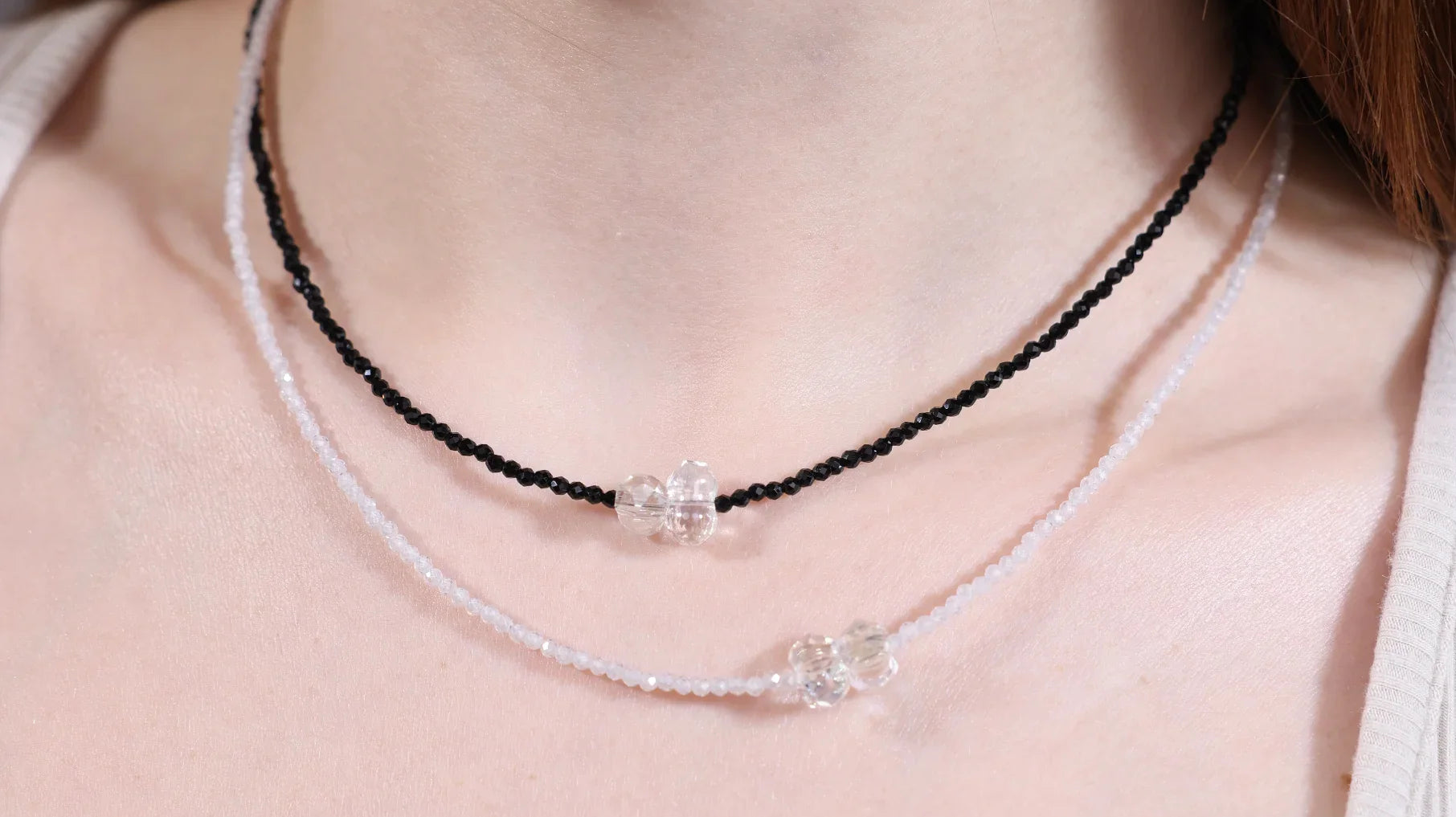 Y2K jewelry revival – black and white beaded chokers with crystal accents, trendy everyday glam styled by Velvet Luminance.