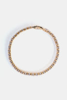 close-up of gold cubic zirconia tennis bracelet with 4mm CZ stones