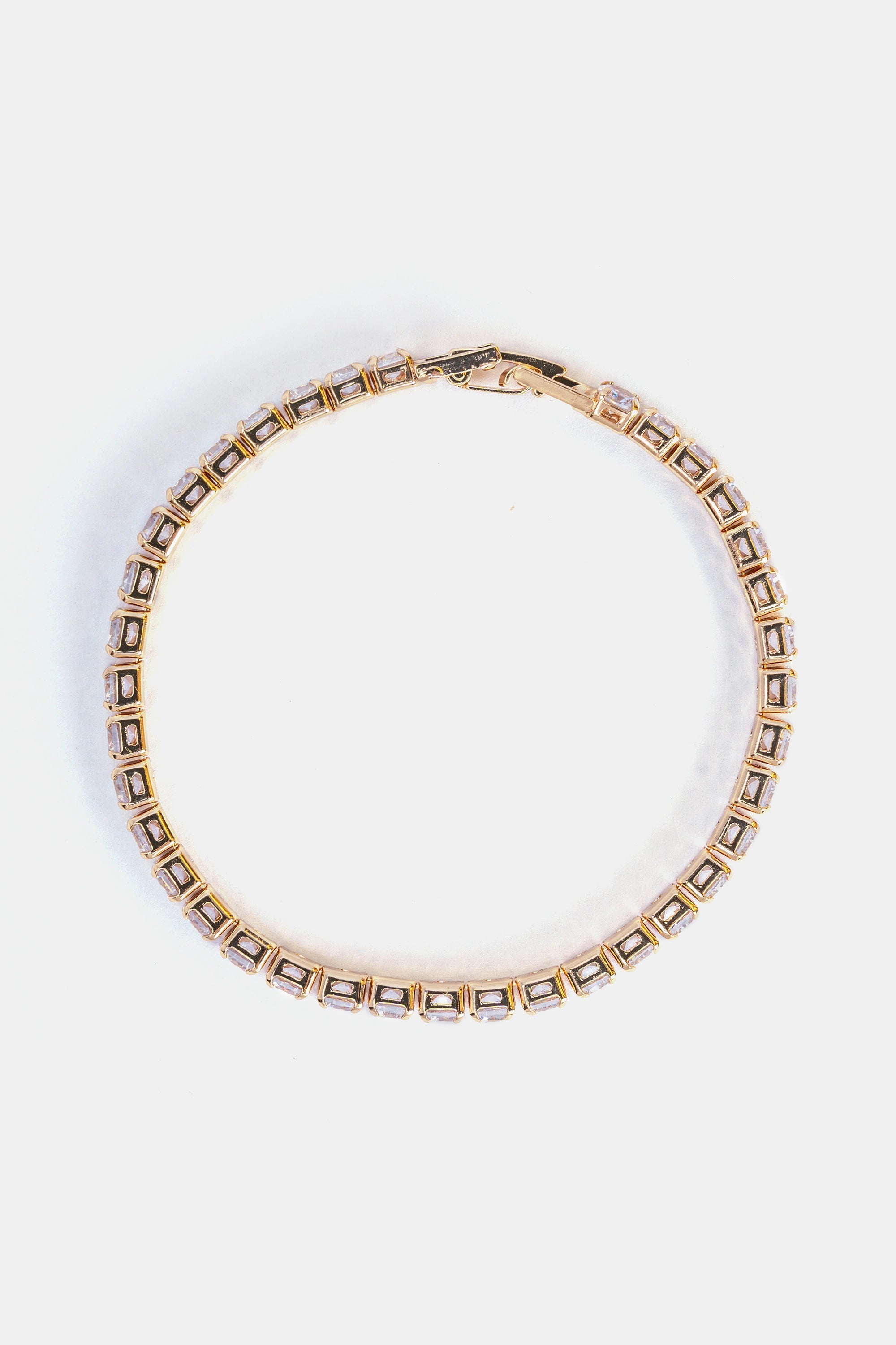 close-up of gold cubic zirconia tennis bracelet with 4mm CZ stones