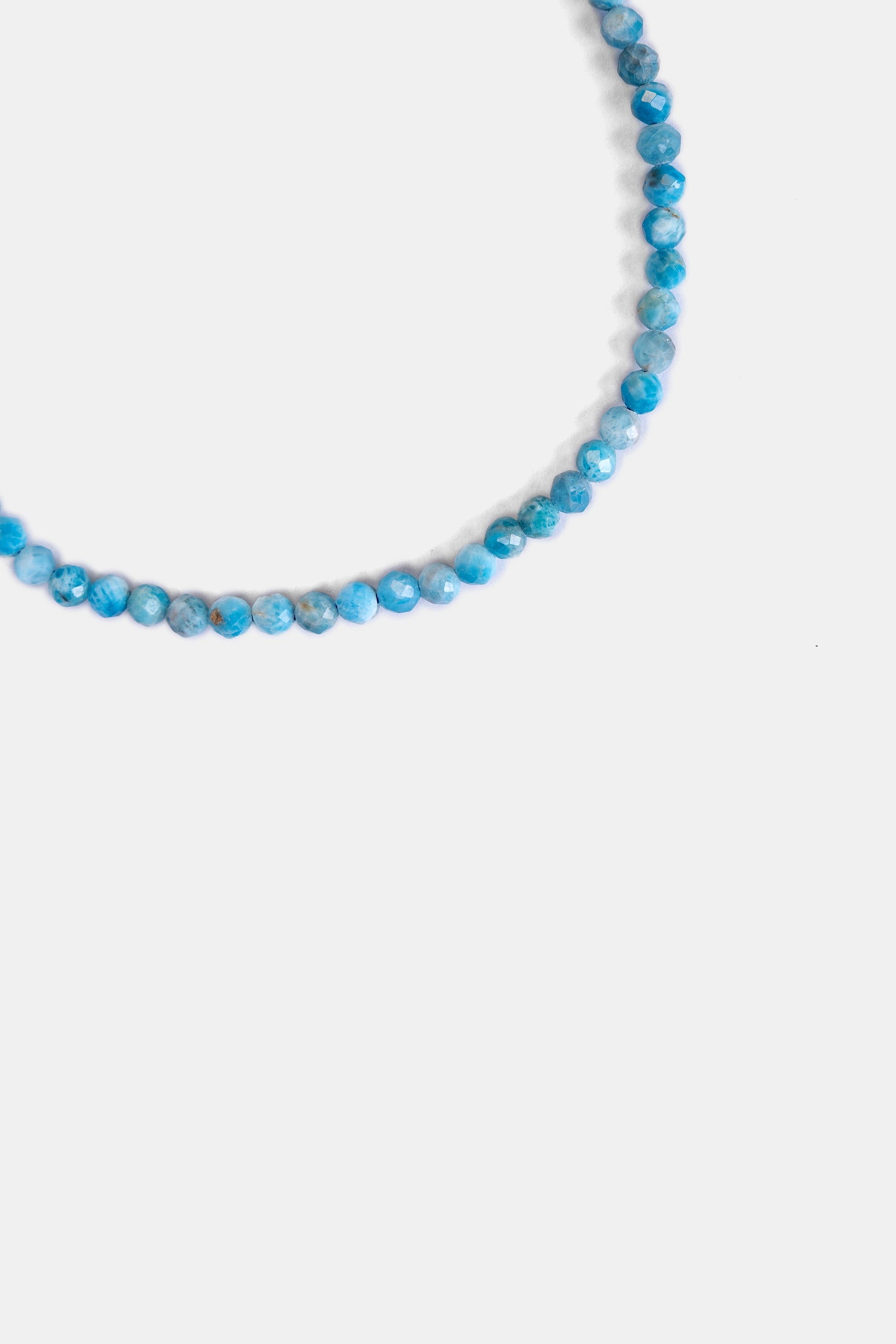 close-up of faceted larimar beads in caribbean blue / Larimar