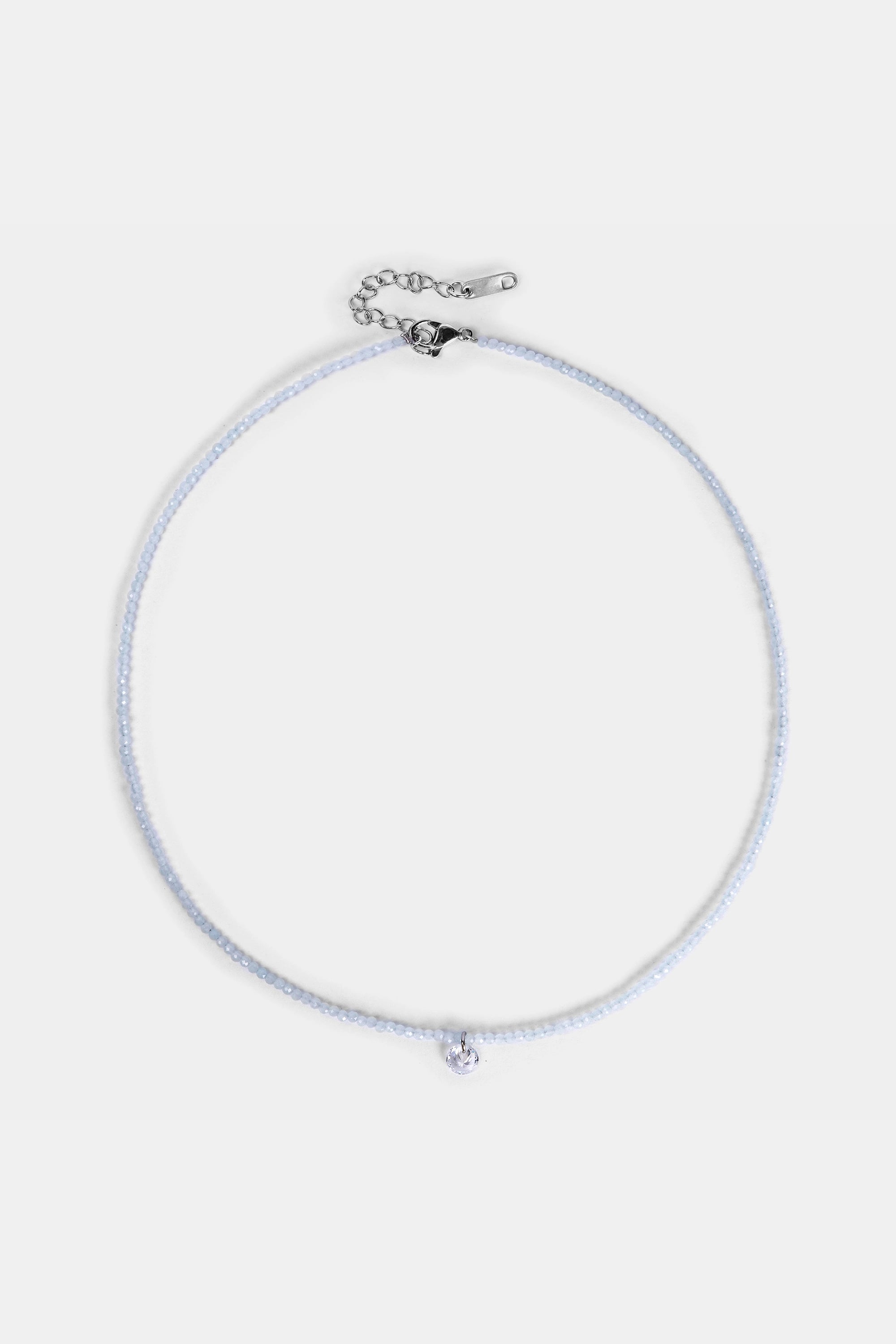 light blue beaded necklace with clear quartz charm – Velvet Luminance