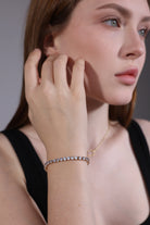 gold cubic zirconia tennis bracelet for layering – portrait view