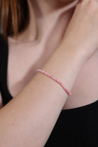 model wearing pink opal bracelet – dainty minimalist jewelry