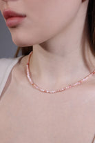 model wearing pink opal beaded choker – minimalist layering