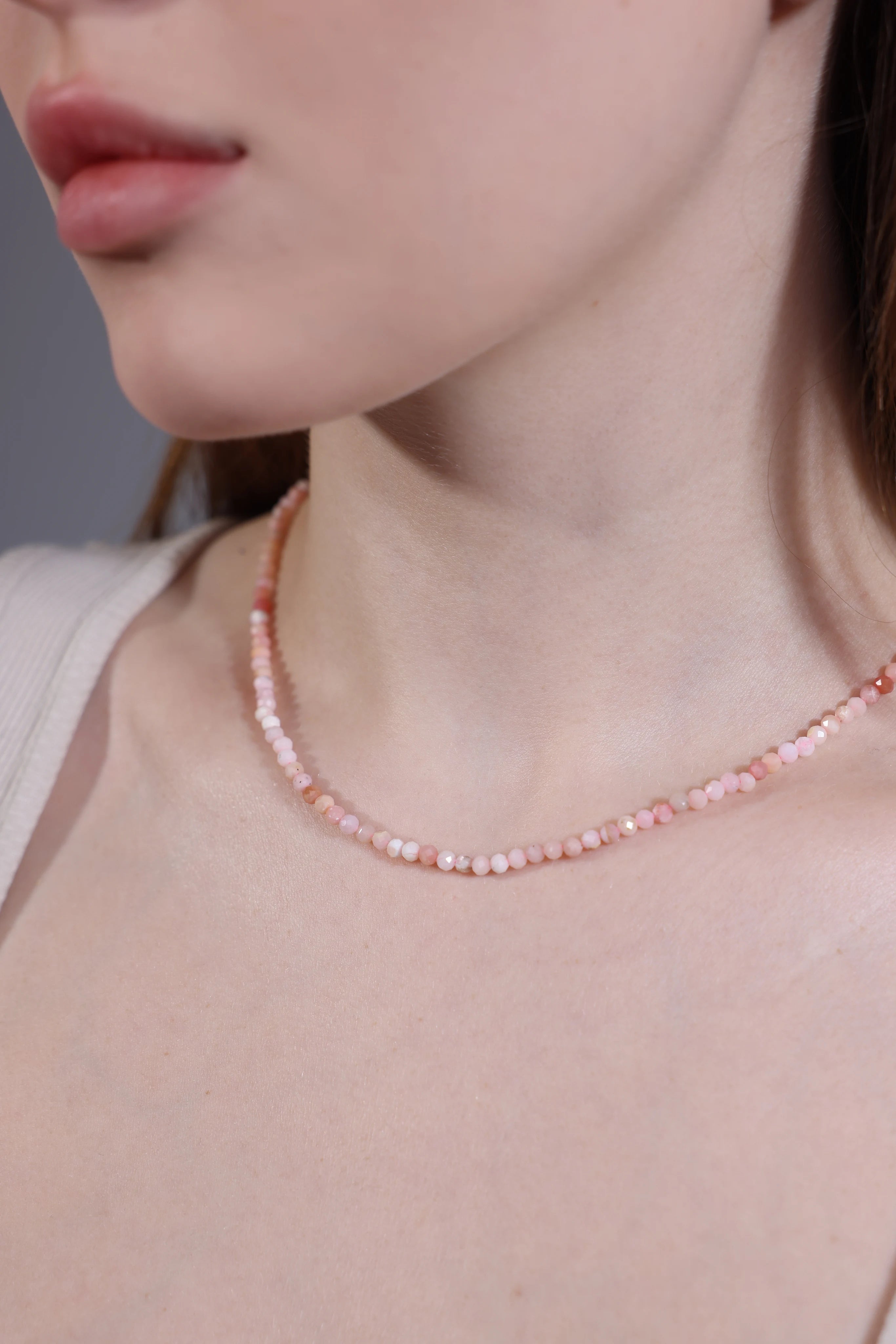 model wearing pink opal beaded choker – minimalist layering