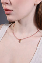 model wearing pink opal pendant beaded necklace – minimalist layering