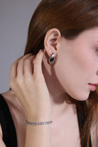 model wearing rose gold tennis bracelet – minimalist jewelry