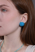 model wearing sky blue hydrangea stud earrings – kawaii jewelry