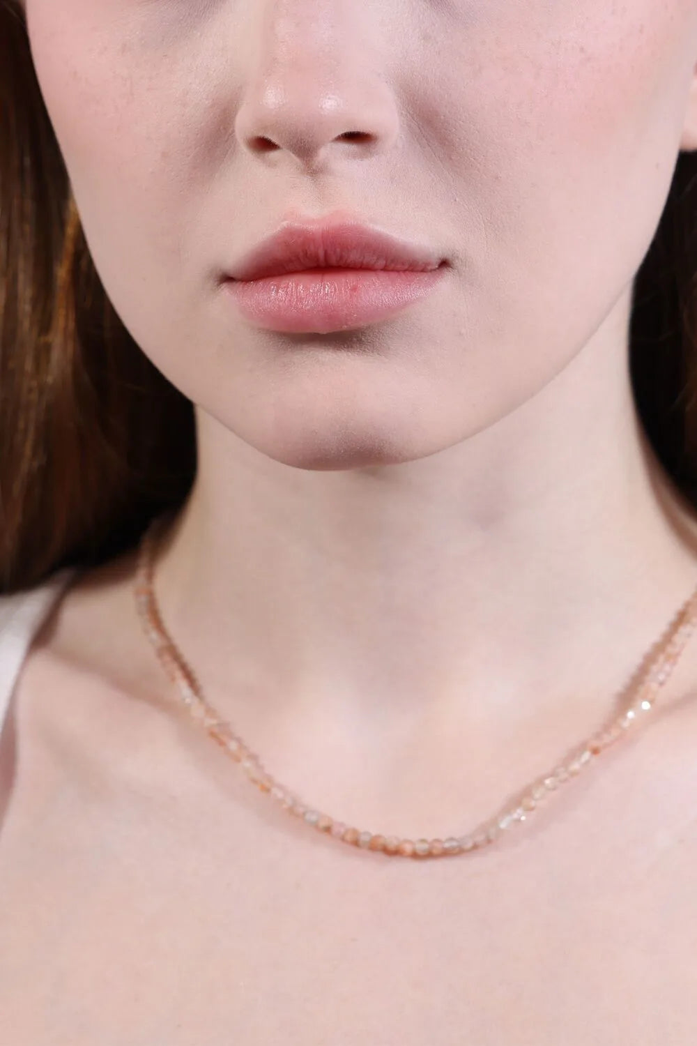 model-wearing-strawberry-quartz-necklace-minimalist-layering