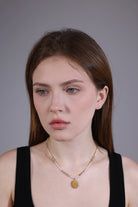 model wearing boho sun pendant beaded choker – ethnic layering jewelry