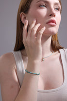 model wearing faceted turquoise bracelet – minimalist boho gemstone jewelry