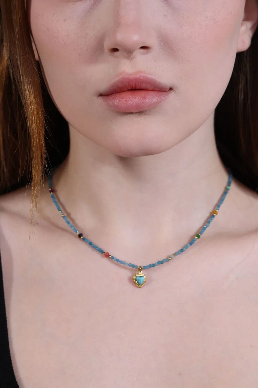 model wearing turquoise heart beaded choker – minimalist boho style