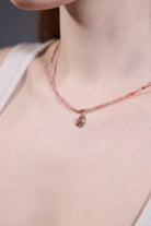 model wearing pink opal pendant beaded necklace – minimalist layering