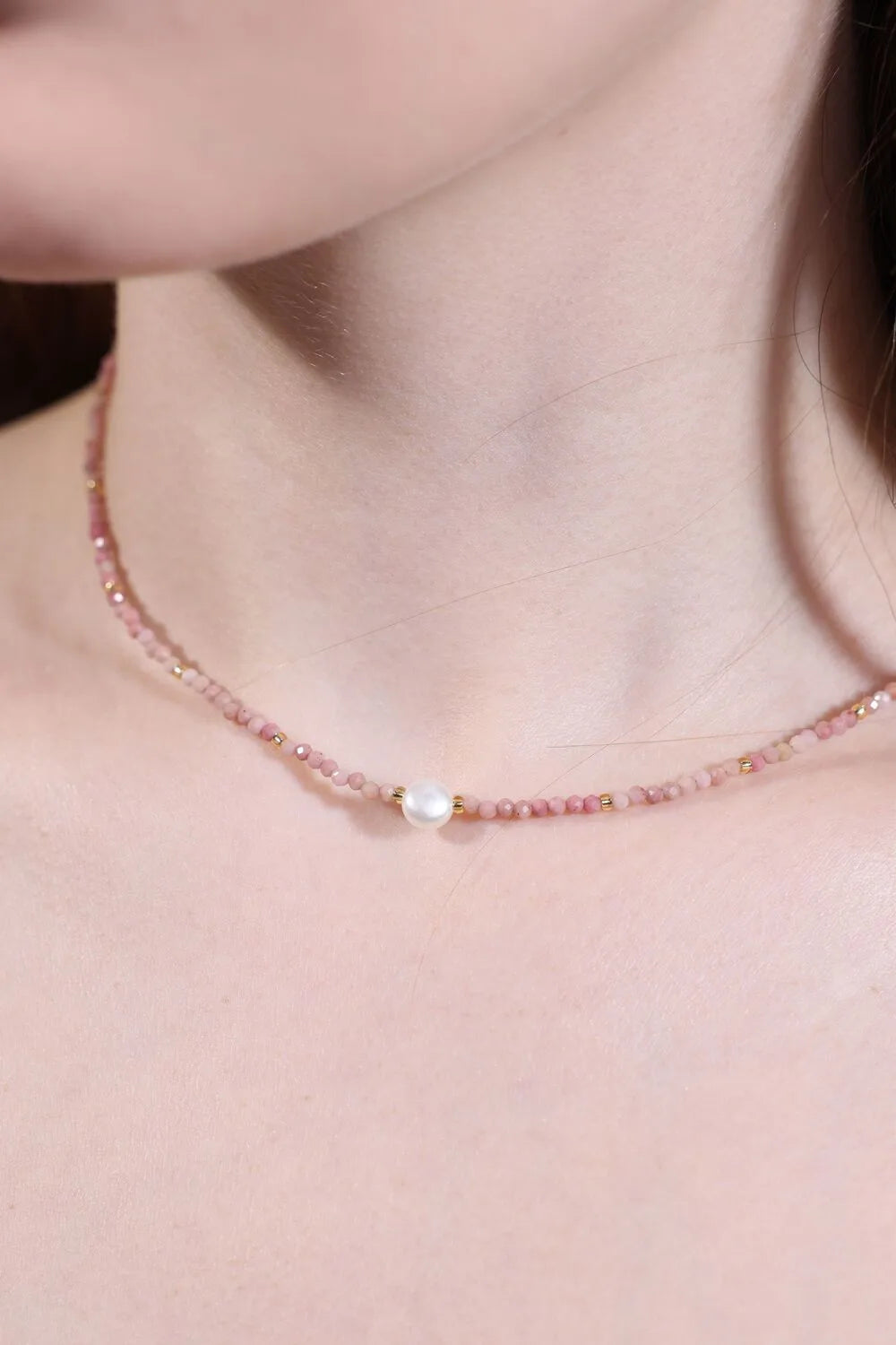side view of pink tourmaline choker with pearl center