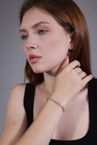 elegant rose gold tennis bracelet for women – portrait view