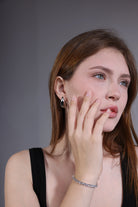 front view of silver chunky teardrop hoop earrings – stainless steel jewelry