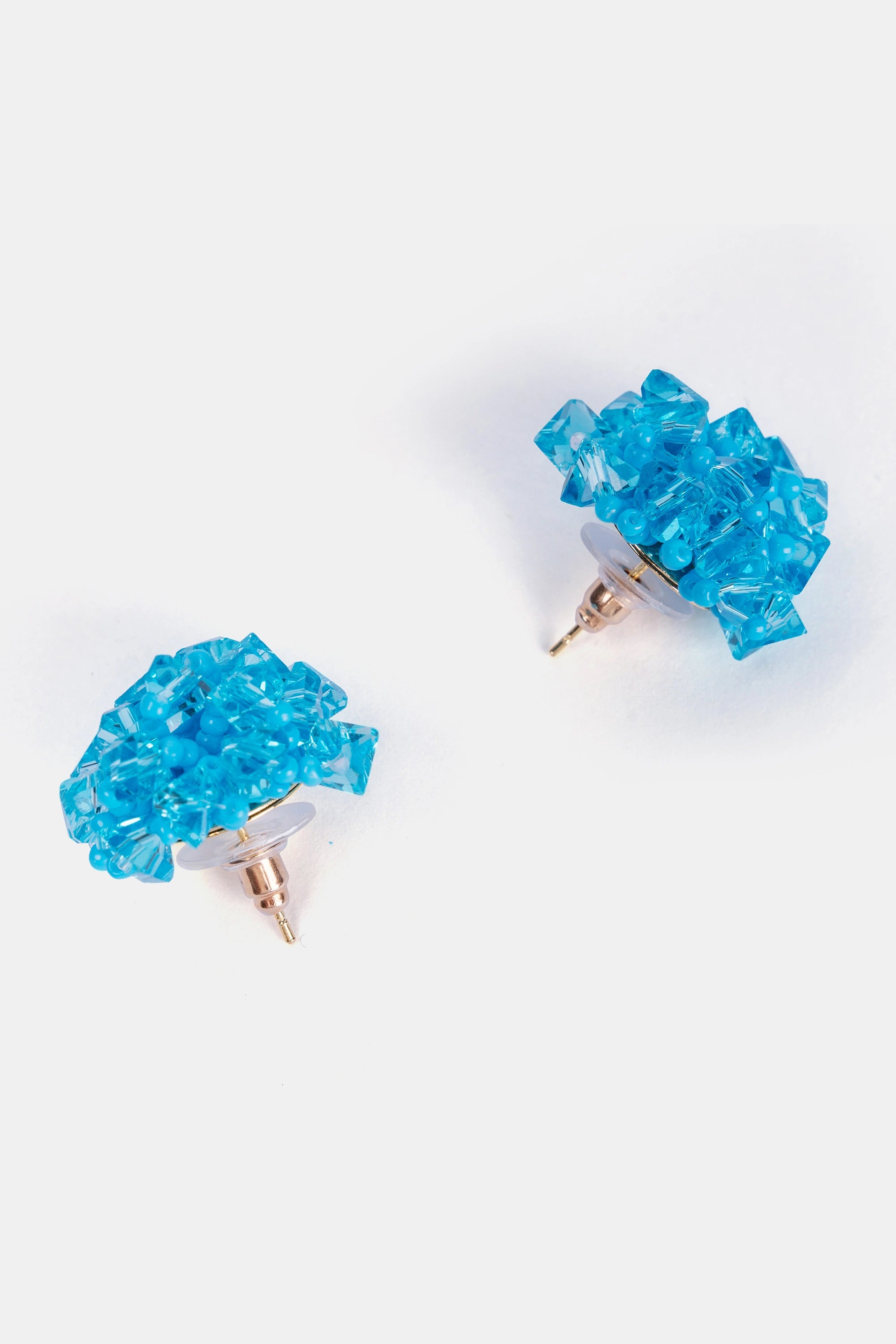 side view of handmade sky blue crystal cluster stud earrings