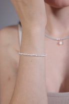 white-gemstone-bracelet-on-wrist-stacking-dainty
