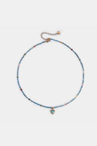 turquoise heart beaded choker with gold-tone extender – Velvet Luminance