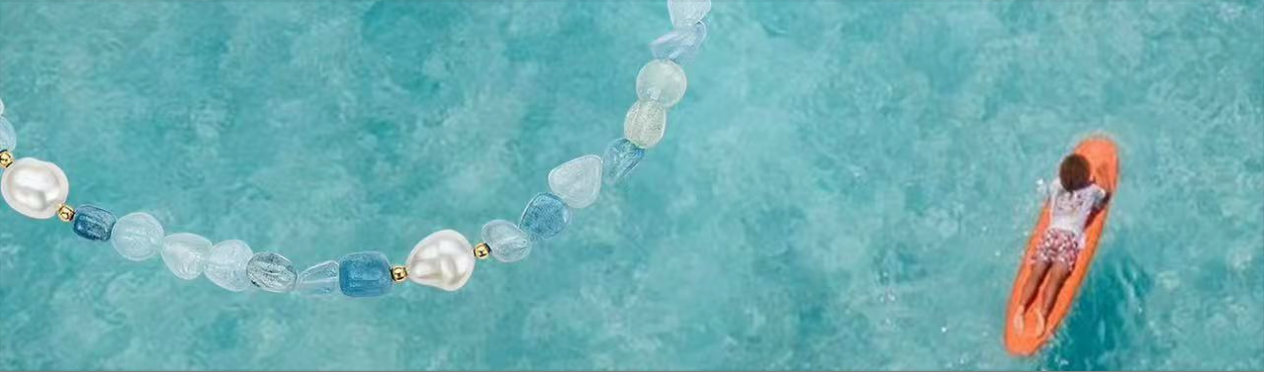 Velvet Luminance minimalist natural gemstone beaded necklace blog banner with ocean background