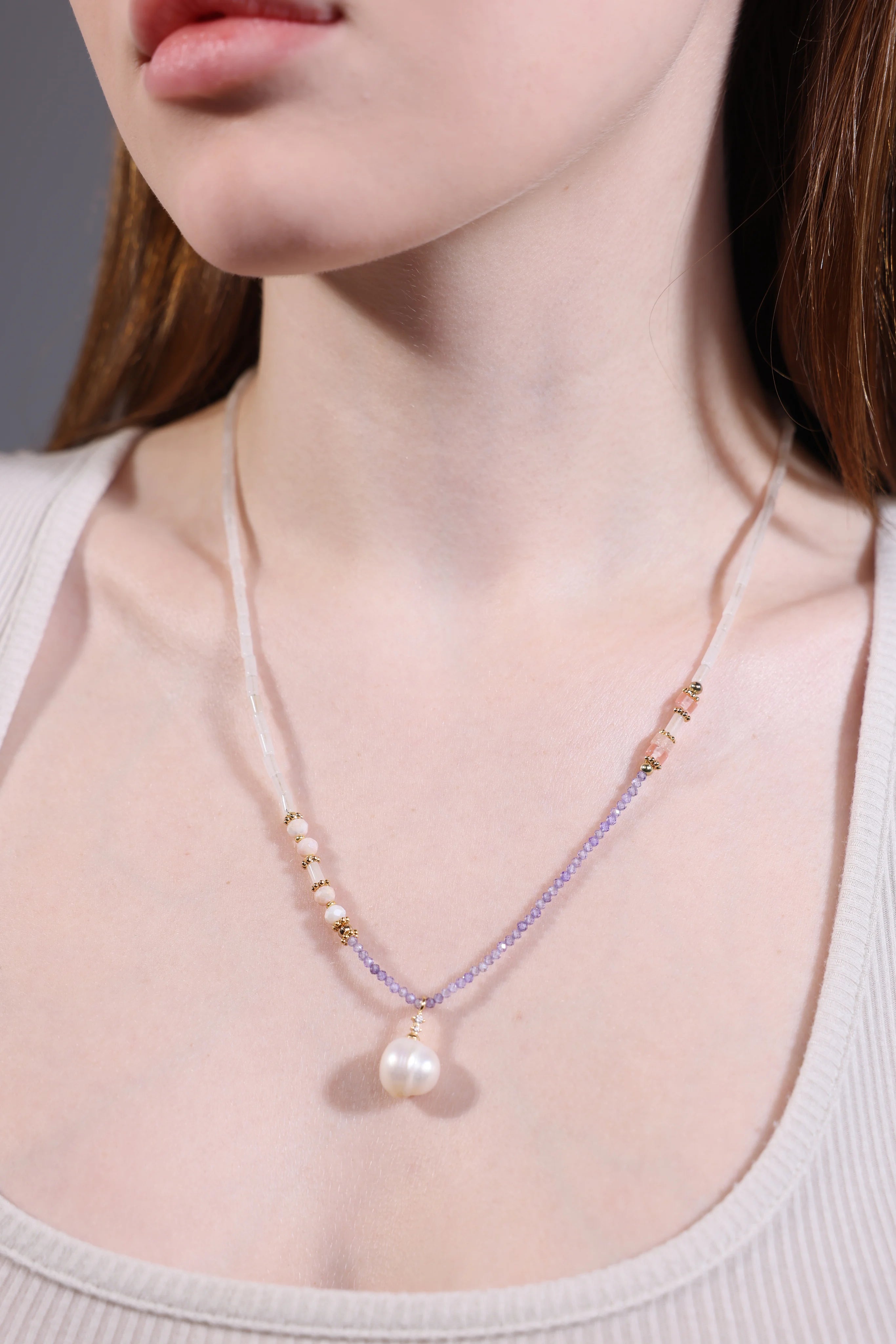 dainty pearl pendant necklace on model – minimalist layering